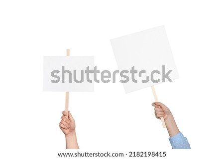 People holding blank protest signs on white background, closeup