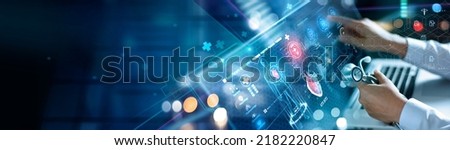 
Cardiologist diagnosis patient heart testing result and human anatomy with database electronic medical record on network. AI, Innovation and technology, Digital healthcare on futuristic hologram. Royalty-Free Stock Photo #2182220847