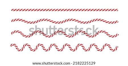 Christmas candy cane wave line with red and white striped. Xmas line with striped candy lollipop pattern. Christmas and new year element. Vector illustration isolated on white background. Royalty-Free Stock Photo #2182225129