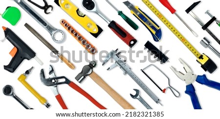 Topview of Different Work Tools on White Background- Stock Photo