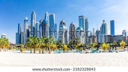 Dubai jumeirah beach with marina skyscrapers in UAE. Popular public JBR beach Royalty-Free Stock Photo #2182328843