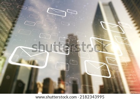Abstract virtual postal envelopes hologram on modern architecture background, email and notification concept. Multiexposure