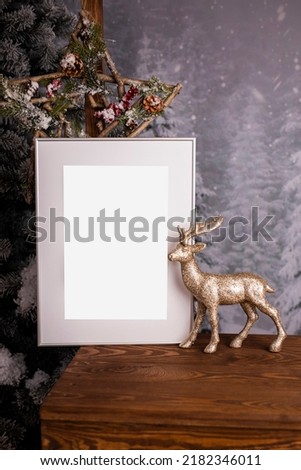 White picture frame with decorations. Mock up for your photo or text. Place your work, print art, white background, pastel color book. Photo realistic 3d illustration. Christmas interior decoration.