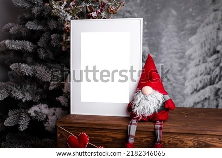 White picture frame with decorations. Mock up for your photo or text. Place your work, print art, white background, pastel color book. Photo realistic 3d illustration. Christmas interior decoration