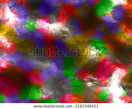 Defocused abstract background of several colorful candies