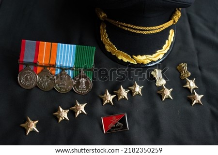 "dridhta aur veerta" means perseverance and bravery. Indian Army Service Ranks, cap and medals. War hero and soldiers. 