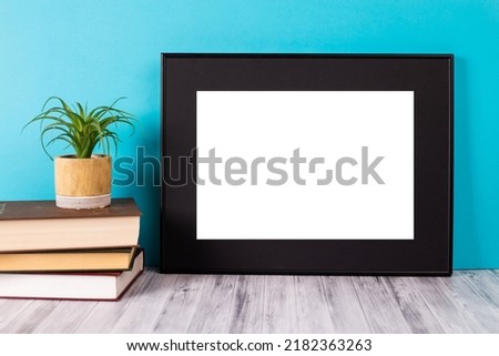 White picture frame with decorations. Mock up for your photo or text. Place your work, print art, white background, pastel color book. Photo realistic 3d illustration