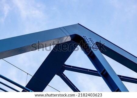 Bridge close-up, metal bridge construction, iron beams Royalty-Free Stock Photo #2182403623
