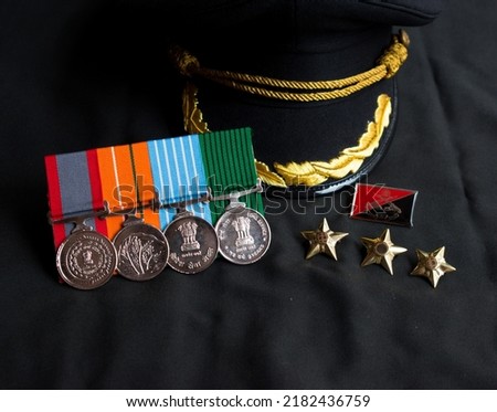 "dridhta aur veerta" means perseverance and bravery. Indian Army Service Ranks, cap and medals. War hero and soldiers. 