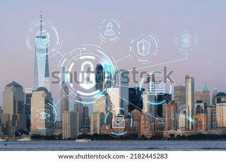 Skyline of New York City Financial Downtown Skyscrapers at sunset. Manhattan, NYC, USA. View from New Jersey. The concept of cyber security to protect confidential information, padlock hologram