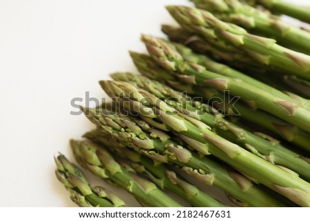 asparagus on white background.fresh asparagus officinalis on white background Royalty-Free Stock Photo #2182467631