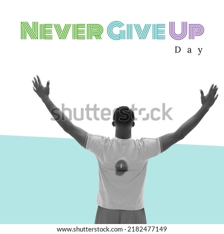 Digital composite image of african american man standing with arms raised, never give up day text. Copy space, believing yourself, motivation, willingness to accept failure, inspiration. Royalty-Free Stock Photo #2182477149