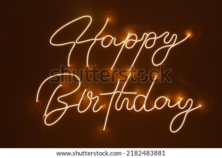 Orange neon happy birthday. Trendy style. Happy Birthday  background. Neon sign. Custom neon. Party decor.