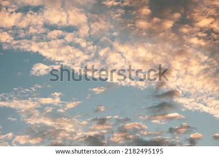 Partly cloudy sky in the evening light