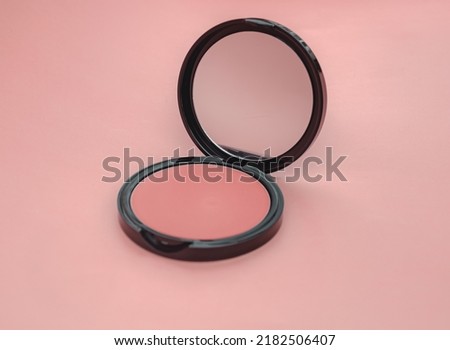 Top view eye shadow, blush, powder, sculptor in case pink isolated background place for text. aesthetics of makeup artist, make-up, make-up for yourself, beauty, salon Royalty-Free Stock Photo #2182506407