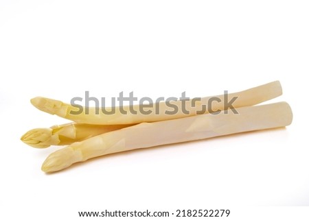 Fresh white asparagus  isolated on white background Royalty-Free Stock Photo #2182522279