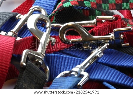 A group of dog leashes Royalty-Free Stock Photo #2182541991