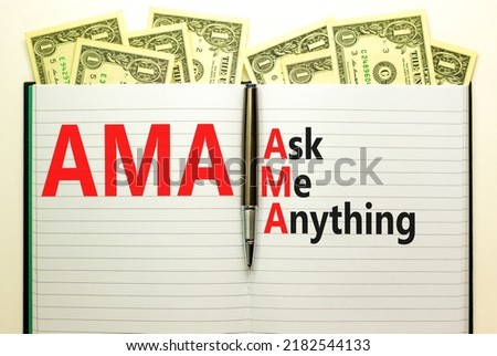 AMA ask me anything symbol. Concept words AMA ask me anything on white note on a beautiful white background. Dollar bills. Metallic pen. Business and AMA ask me anything concept. Copy space.