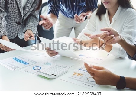 Planning to reduce investment risks, the image of a group of businesspeople working with partners is adjusting marketing strategies to analyze profitable and targeted customer needs at meetings Royalty-Free Stock Photo #2182558497