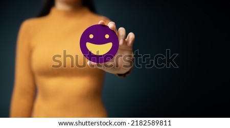 Customer Experience Concept. Happy Client giving Positive Review. Exellent Feedback for Products and Services. Client Satisfaction Surveys. Smiling Face, Mind and Mental Health Royalty-Free Stock Photo #2182589811