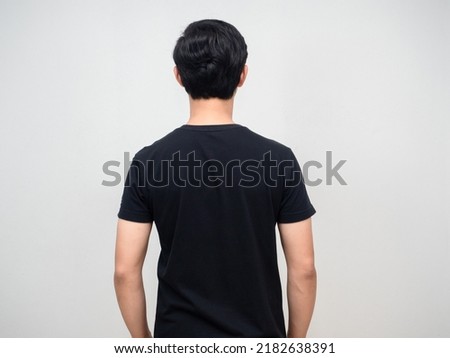 Behind of man black shirt stand turb back isolated