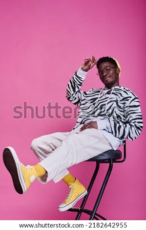African teenage boy in stylish clothes Royalty-Free Stock Photo #2182642955
