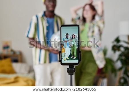 Couple of vloggers dancing with disco ball Royalty-Free Stock Photo #2182643055