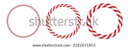 Christmas candy cane circle frame with red and white striped. Xmas border with striped candy lollipop pattern. Blank christmas and new year template. Vector illustration isolated on white background. Royalty-Free Stock Photo #2182651853