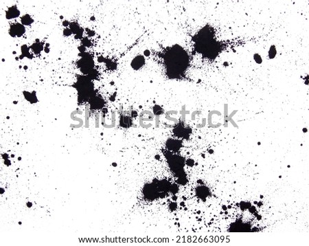 Black ink spots on a white background. Royalty-Free Stock Photo #2182663095