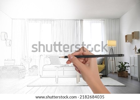Woman drawing living room interior design, closeup. Combination of photo and sketch Royalty-Free Stock Photo #2182684035