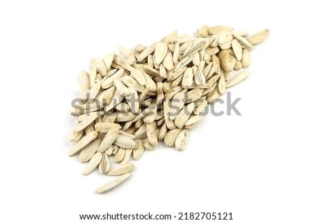 Dry organic sunflower seeds isolated on white, top view