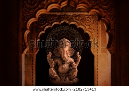Lord ganesha antique sculpture for ganesha festival. Royalty-Free Stock Photo #2182713413