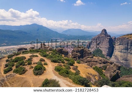 Rock formation in central Greece. Sunny weather. Outdoor shot. Blue sky with fluffy white clouds. High quality photo