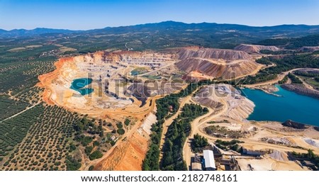 Open-pit mining concept. Drone aerial view of an open-pit mine in Greece. Human and environment concept. High quality photo Royalty-Free Stock Photo #2182748161
