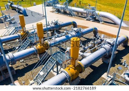 Gas pipeline Gazelle. One part of Nord Stream pipeline from Russia to European Union. High pressure pipes on a hot summer day. Royalty-Free Stock Photo #2182766189