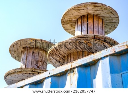 typical empty wooden cable drums - photo Royalty-Free Stock Photo #2182857747