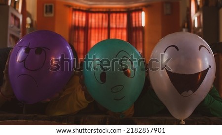 Posing with the balloon masks.  