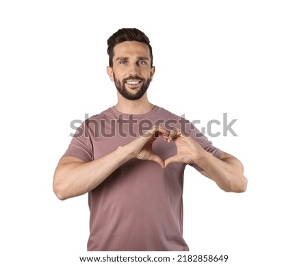 Happy man making heart with hands on white background