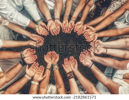 Hands of girls form a circle. Ceremony space. Royalty-Free Stock Photo #2182861571