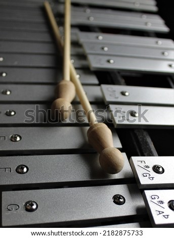 Glockenspiel instrument and hammers for music class Royalty-Free Stock Photo #2182875733