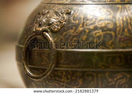 Ancient Chinese cultural relics of the Han Dynasty in the museum, painted clay bottles and containers Royalty-Free Stock Photo #2182881379