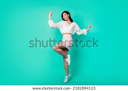 Full body photo of positive cheerful cute lady dance discotheque music dj isolated cyan color background