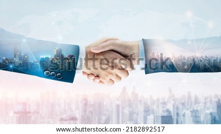 Successful businessman handshake startup new project at city skyline background, Double exposure of professional teamwork and network connection partnership concept, International business investment Royalty-Free Stock Photo #2182892517