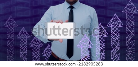 Businessman Showing Tablet By Arrow Symbols Moving Up And Digital Network With A Futuristic Design. Man Wearing Necktie Presenting New Ideas For Business Success.