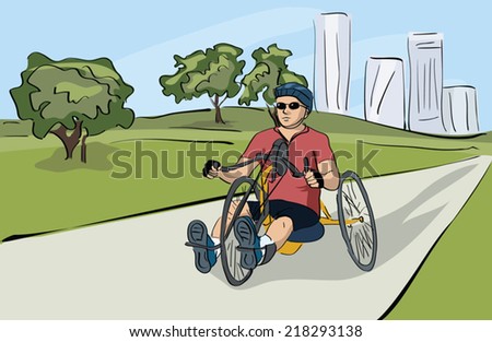 disabled man  riding bicycle at the park