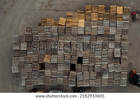 Aerial shot of wooden palette pile