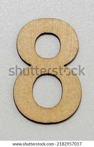 various letters from the alphabet and numbers made of thin wood. Individually as a pile or as lettering DSGVO.