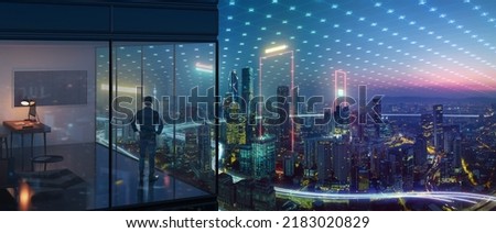 Young business man standing in the office watching the modern city night view with abstract polygon pattern connection with speed line light. SMART Business Goal concept. Royalty-Free Stock Photo #2183020829