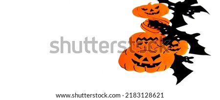 Halloween paper decor on white background. Happy holiday concept.