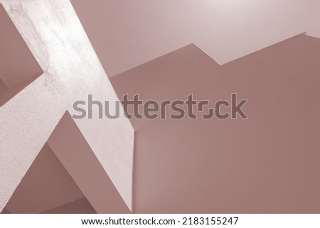 Abstract pastel geometric angular shapes walls architecture background. looking up to the sky. clear earth colors shades, brown or light cream. modern, contemporary, simple, concept. empty structure. 